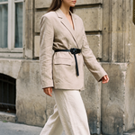 Margot black knot waist belt worn over an oversized beige blazer