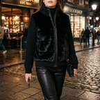 Vivienne black faux fur jacket worn at night