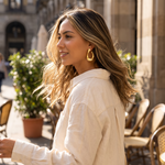 Amara sculpted gold hoops candid outdoor shot