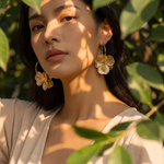 Fiora drop earrings in dappled sunlight