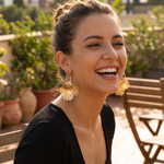 Fiora drop earrings candid outdoor shot
