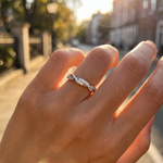 Selene ring worn in golden hour light