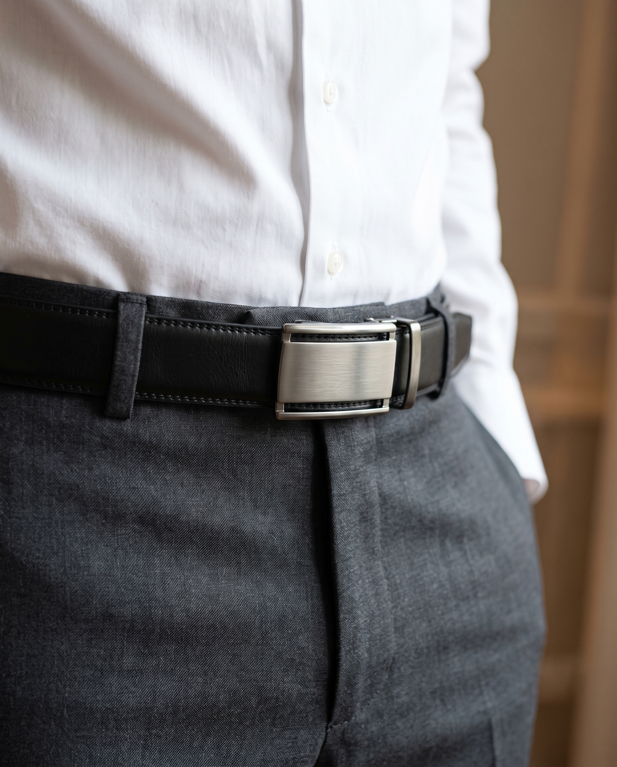 Halden belt worn with tailored trousers