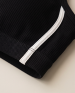 Close up of the white contrast piping