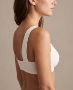 Side view showing the wide straps and back band