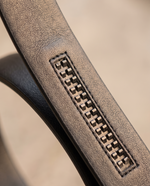 Underside of the belt showing the ratchet track