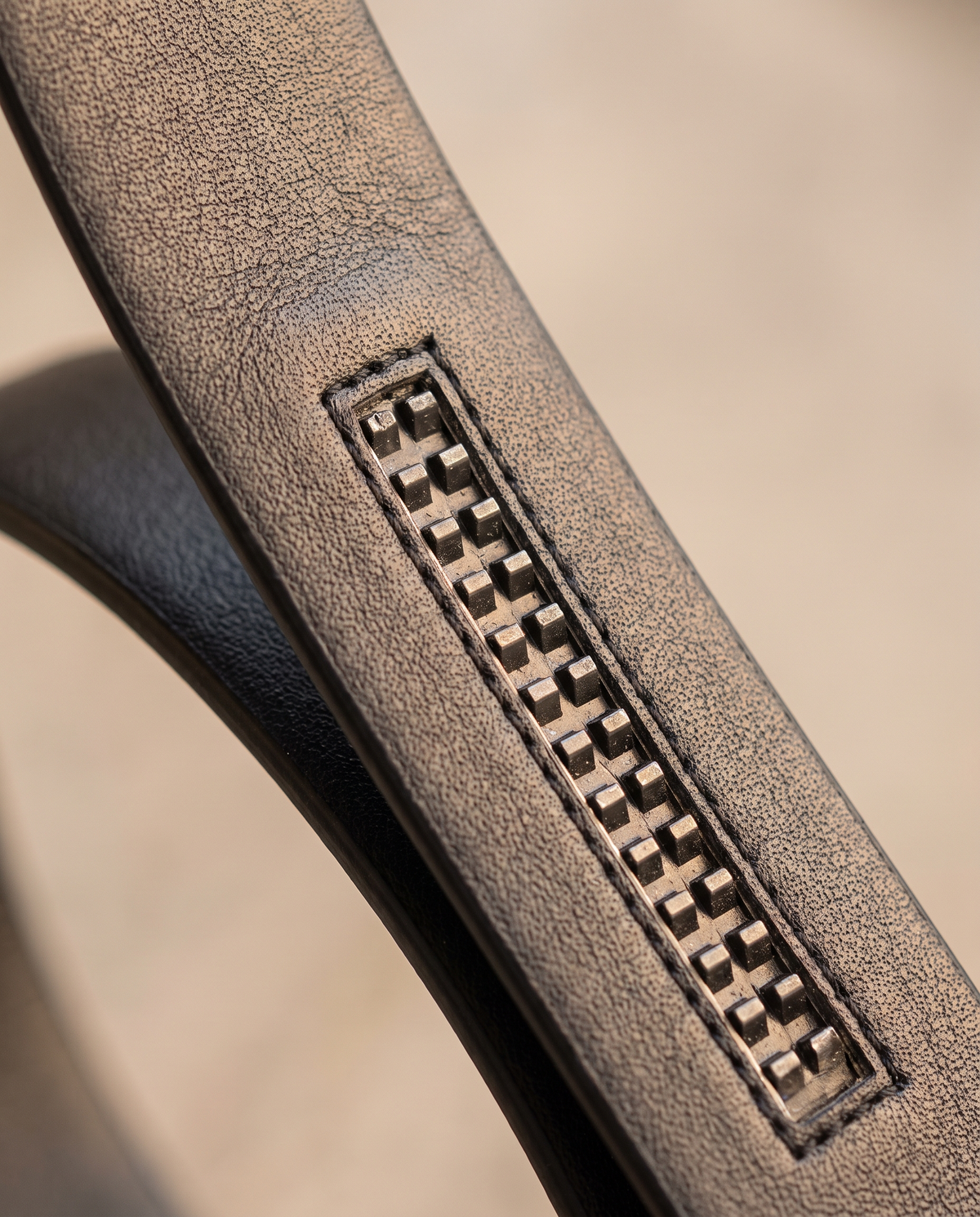 Underside of the belt showing the ratchet track