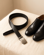 Rein belt styled beside dress shoes