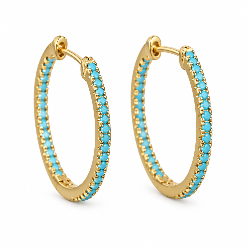 Marina turquoise hoops in gold on a white background