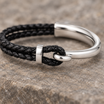 Close up of the braided cord and silver hook clasp