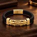 Atlas bracelet in gold on dark leather
