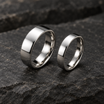 Orion tungsten bands in 5 mm and 3.5 mm side by side on stone