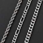 Close up of the rope, figaro and curb chains
