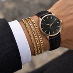 Gold Dorian bracelets stacked with a watch